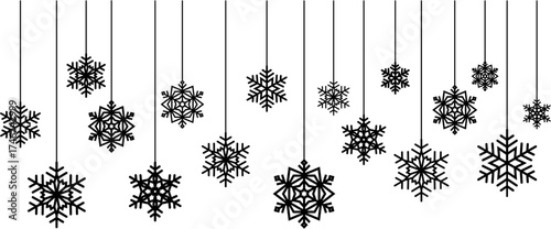Silhouette snowflakes hanging to transparent background