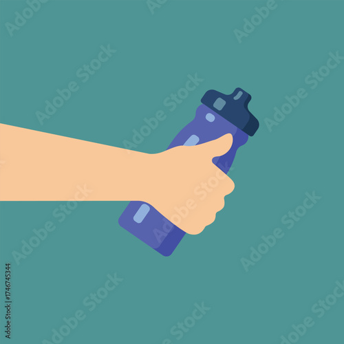 Hand holding a blue sports water bottle for hydration and fitness