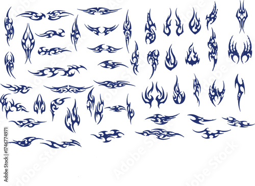 Collection of dark blue tribal flame and abstract swirl tattoo designs on white background