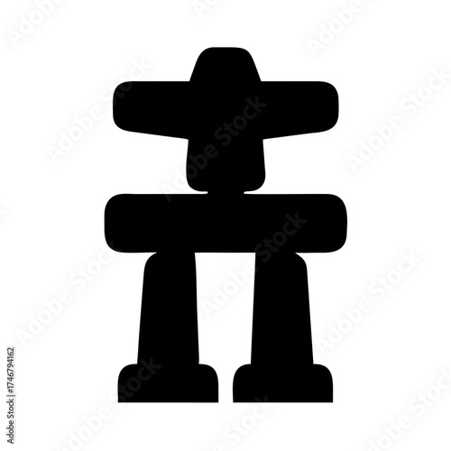Vector art of silhouette of an inukshuk, a stone landmark or cairn built by humans, traditionally by the inuit, in the form of a human figure
