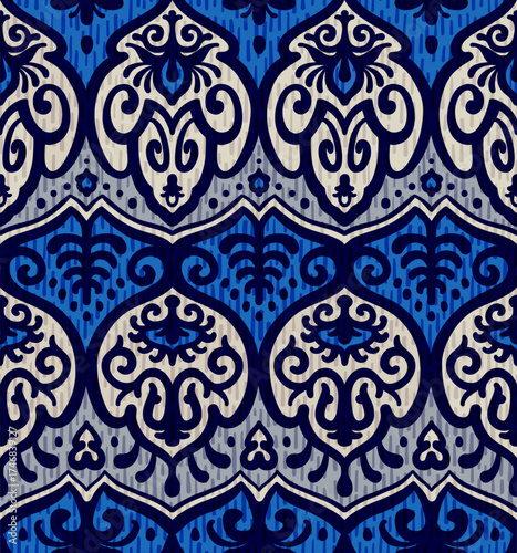Wallpaper Mural Seamless ikat inspired ornamental pattern with traditional ethnic floral motifs in rich blue tones Torontodigital.ca