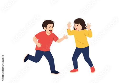 A young boy playfully chases a surprised young girl while playing a game of tag.
