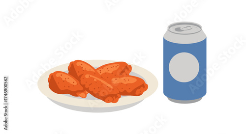 Chicken wings on a plate with a blue soda can beside it