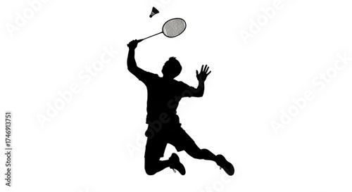 silhouette of a man playing badminton