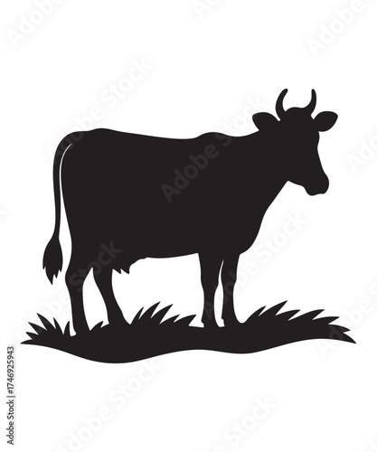 Silhouette of a Cow Standing on Grass
