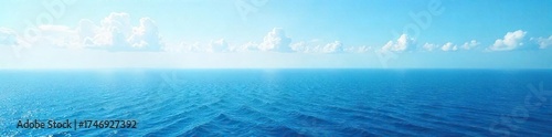 Serene Ocean Horizon Tranquil Blue Waters Meet the Sky at a Hazy Distant Line, Perfect for Travel, Nature, and Serenity Themes