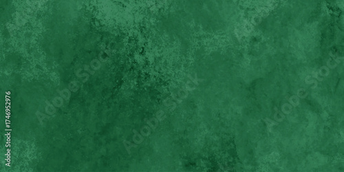 Abstract Elegant dark green background with mottled vintage texture in old fancy background design, texture of colored parchment paper.