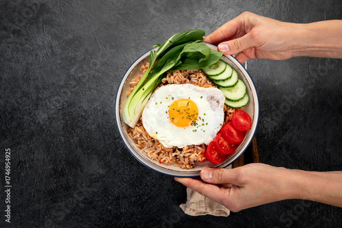 Wallpaper Mural ndonesian nasi goreng (fried rice) served on a plate. Torontodigital.ca