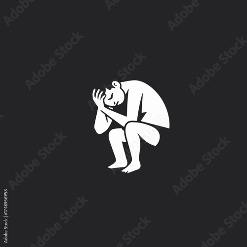 A stylized silhouette of a person sitting, head in hands, expressing sadness.