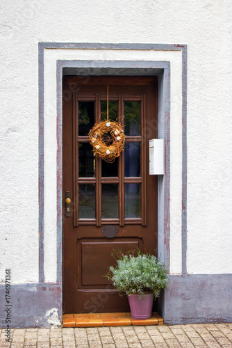 Old wooden house door in German small town, Issum, North-Rhine Westphalia