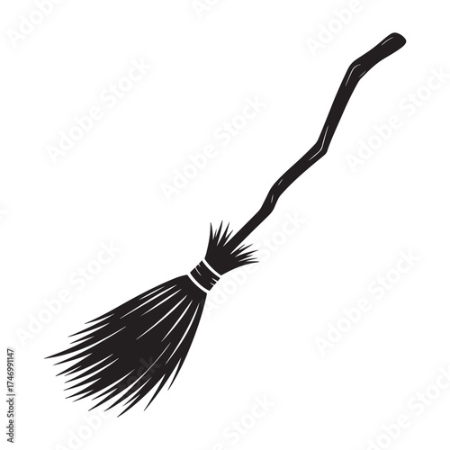 Hand drawn black silhouette of a traditional witch s broomstick with bristles on a white background