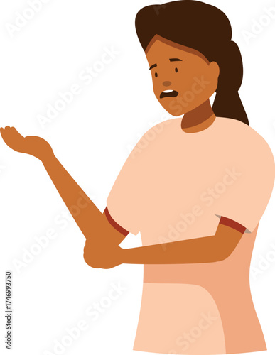Young female nurse experiencing elbow pain, holding her aching arm and showing it