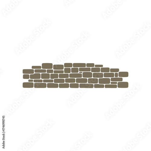 Rough textured irregular stone wall background with a natural earthy brown and gray color palette for rustic design elements