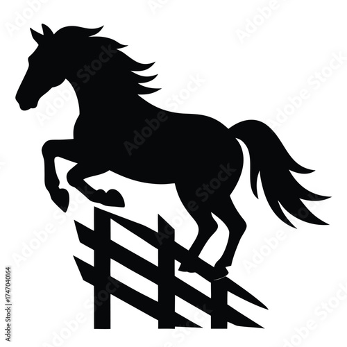 Black horse jumping over fence silhouette