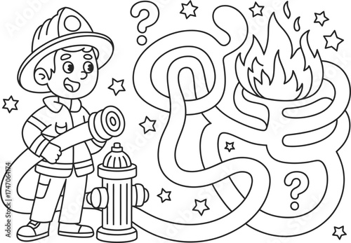 Cute firefighter boy holding hose next to hydrant and maze