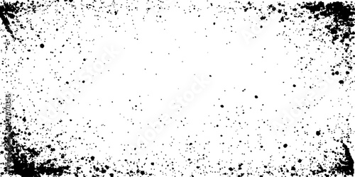 Grunge black and white distress texture. Scratch texture. A textured, black and white graphic with a radial pattern of dots creates a striking border around a blank center.