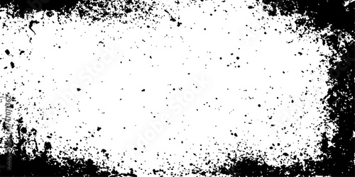 Grunge black and white distress texture. Scratch texture. A textured, black and white graphic with a radial pattern of dots creates a striking border around a blank center.