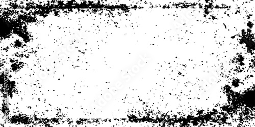 Grunge black and white distress texture. Scratch texture. A textured, black and white graphic with a radial pattern of dots creates a striking border around a blank center.