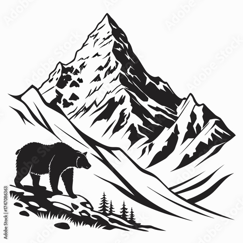 Black silhouette of a bear walking in front of a mountain range