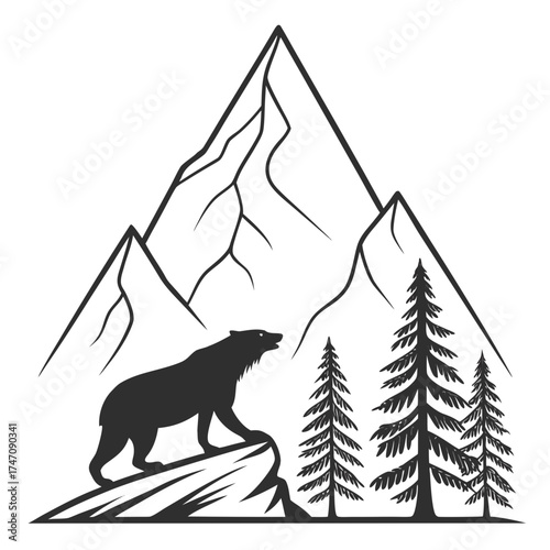 Black bear on rocky outcrop with pine trees and mountains