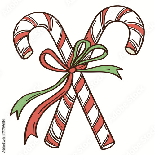 Crossed candy canes with red green ribbon bow pair