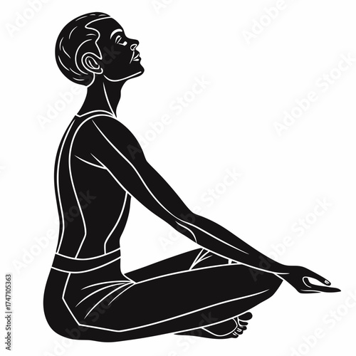 Black silhouette of person in lotus yoga pose meditation