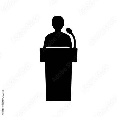 Silhouette of a person standing behind a podium giving a speech presentation