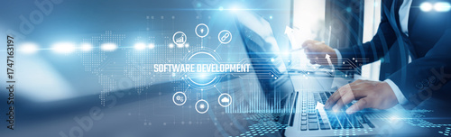 Obraz na płótnie Businessman using laptop and software development analyzing technological data, agile coding, full-stack solutions, cloud deployment, API integration, and mobile & enterprise applications