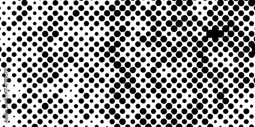 Abstract halftone pattern black dotted white background varying sized of black circles, dotted halftone gradient seamless pop art modern background of monochrome overlay design element.