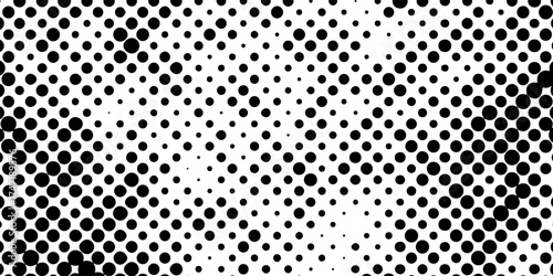 Abstract halftone pattern black dotted white background varying sized of black circles, dotted halftone gradient seamless pop art modern background of monochrome overlay design element.