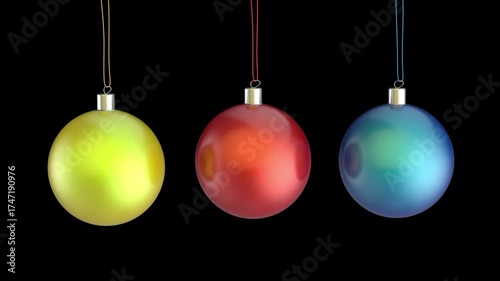 Three colorful Christmas ornaments on black background