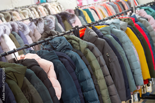 Winter jackets on a rack in a store