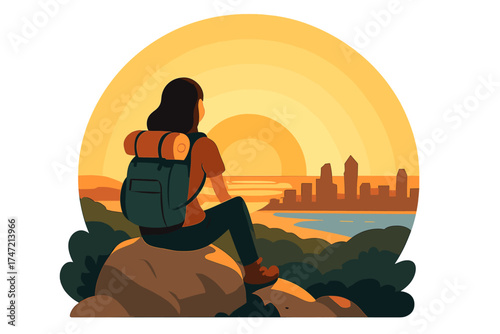 Back view of a female hiker perched on a rock atop a hill, gazing at the San Diego California sunset