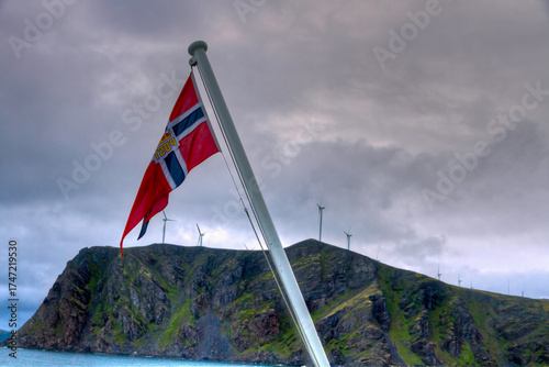 Norwegian fkag at windfarm on island near Haveysund, Norway