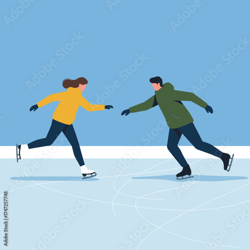 Young couple ice skating together on outdoor rink in winter  