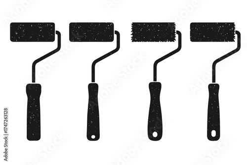 Vintage paint rollers set on white background
