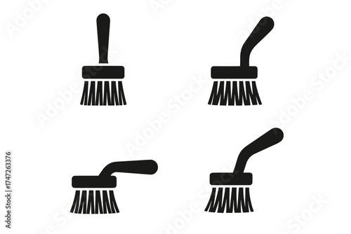 Set of four black scrubbing brush icons with different handle angles