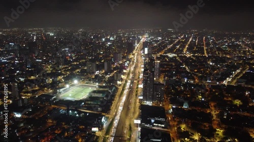Wallpaper Mural Brightly illuminated city landscape of lima, peru showing heavy traffic on javier prado avenue at Torontodigital.ca