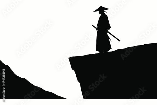 Silhouette of a lone samurai warrior standing on a cliff edge holding a sword