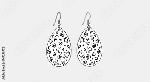 Two teardrop earrings with floral, heart, and star designs hang against a light gray background.