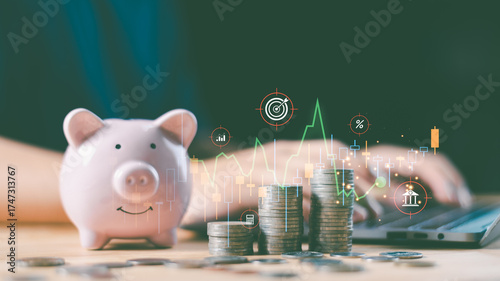 Cuadro en lienzo Finance and investment strategy with piggy bank, stacked coins, and economic chart