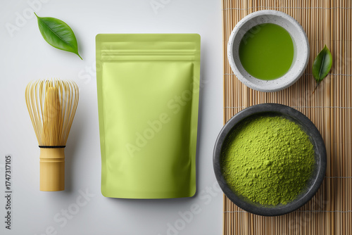 Green and kraft pouch mockup with matcha tea and bamboo whisk