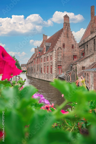 Bruges, Belgium. Brugge. View of the typical canals of the town of Bruges, showing the architecture.