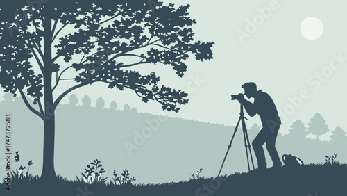 Silhouette of a photographer using a tripod in a tranquil nature scene capturing the serene landscape perfect for travel nature and photography websites.