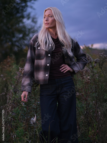 Golden Hour Serenity – Woman Enjoying a Warm Autumn Evening