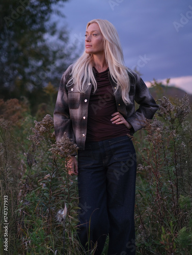 Golden Hour Serenity – Woman Enjoying a Warm Autumn Evening
