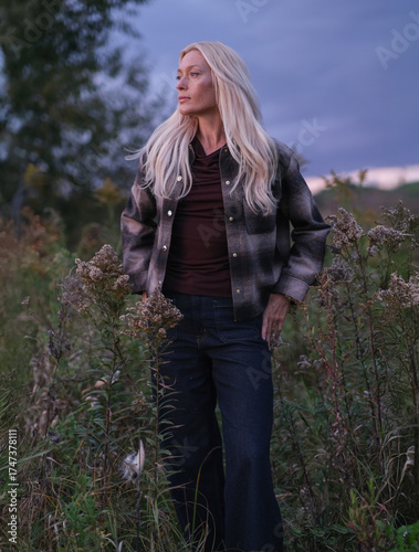 Golden Hour Serenity – Woman Enjoying a Warm Autumn Evening