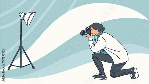 Photographer Kneeling Taking Photo with Studio Lighting Setup.