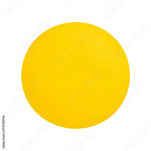 Bright yellow circle with a thin outline against a stark black background