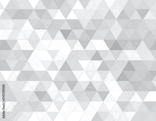 Abstract geometric pattern of overlapping triangles in varying shades of gray and white
